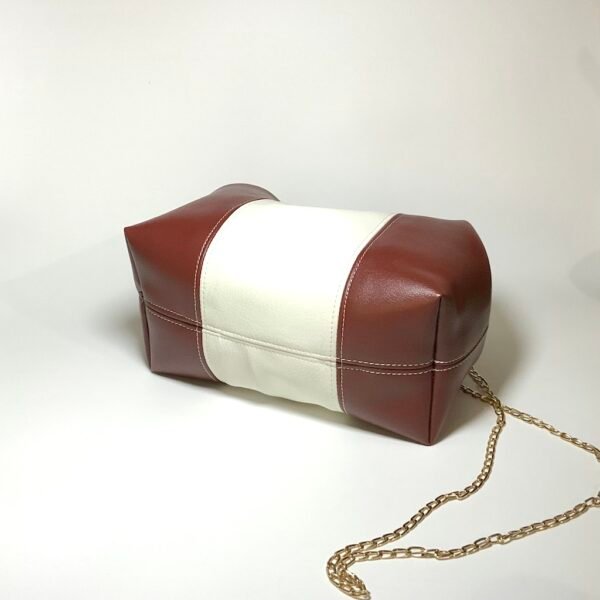 Base of Brown And White Clutch