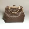 Brown Woven Clutch